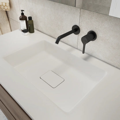 Grifo de lavabo empotrado a pared Stillo Hades acabado negro mate liso con caño de 176mm diseño minimalista moderno